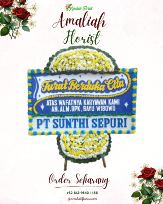 Papan Bunga Duka di Tengah